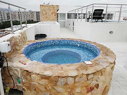 Apartasuites La Flora