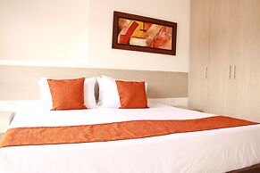 Apartasuites La Flora