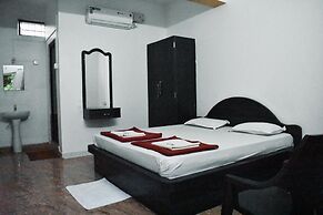 Iroomz Hotel Gananjaya - Hostel