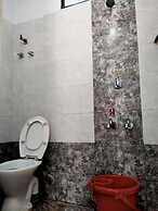 Iroomz Hotel Gananjaya - Hostel