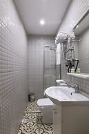 Guzi Rooms & Suites