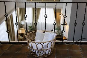 Guzi Rooms & Suites