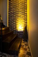 Guzi Rooms & Suites