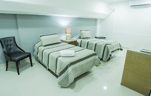Malecon Rooms & Hotel