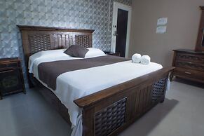 Malecon Rooms & Hotel