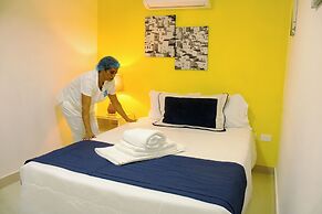 Malecon Rooms & Hotel