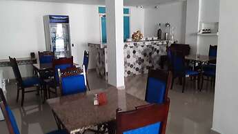 The Garden Hotel y Restaurant