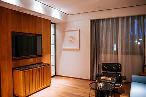 QI Hotel