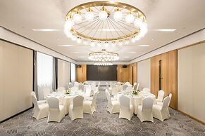 QI Hotel