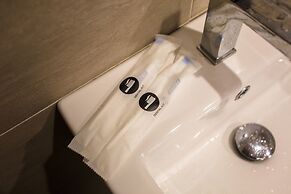 OwnAStay Midhill by Symphony Suite