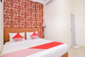 Capital O 854 Ub Caisar Hotel