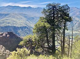 Cabañas entre montañas con tinajas calientes