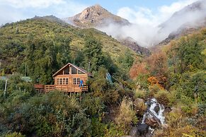Cabañas entre montañas con tinajas calientes