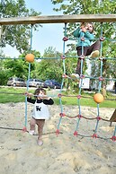 Camping Le Petit Lion - Lodges Bois