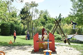 Camping Le Petit Lion - Lodges Bois