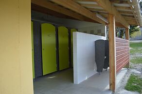 Camping Le Petit Lion - Lodges Bois