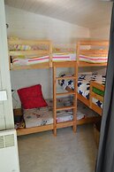 Camping Le Petit Lion - Lodges Bois