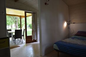 Camping Le Petit Lion - Lodges Bois