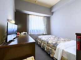 Tabist IWATA Station Hotel