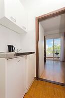 Apartment and Rooms Artina