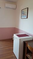 Apartments and Room Caric