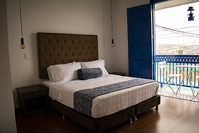 El reloj casa hotel
