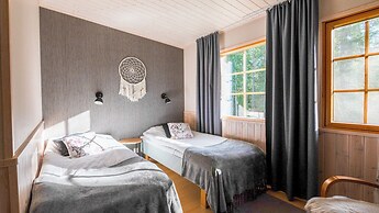 Isokenkäisten Klubi, Wilderness lodge