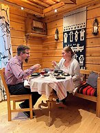 Isokenkäisten Klubi, Wilderness lodge