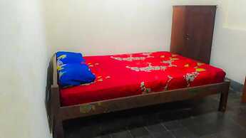 Losmen 2000 Tiga