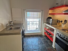 De Waterkant Cottages