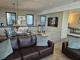 De Waterkant Cottages