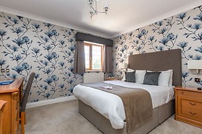 De Rougemont Manor Hotel & Suites