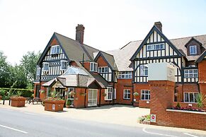 De Rougemont Manor Hotel & Suites