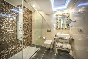 Koukounaria Hotel & Suites