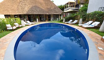 Le Petit Village Hotel & Spa