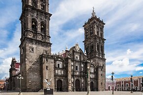 One Puebla Finsa