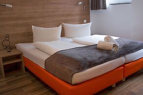 Orange Hotel und Apartments
