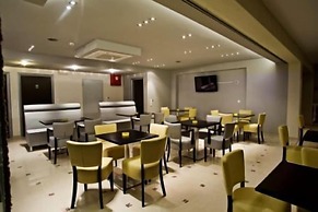 RG Status Hotel