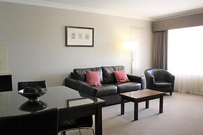Carlyle Suites & Apartments