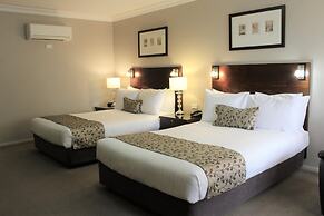Carlyle Suites & Apartments