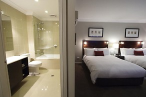 Carlyle Suites & Apartments