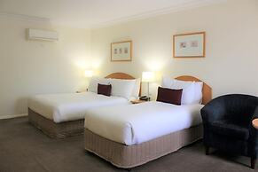 Carlyle Suites & Apartments