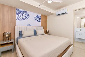 Surfside Beachfront Suites by Playa Caracol Resorts
