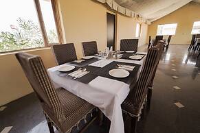 Rajwada Desert Camp by Park Tree