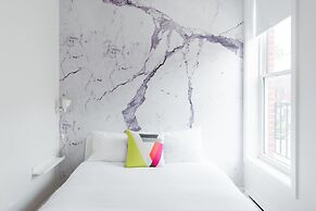 Explore Montreal From Sleek Contemporary Apartment