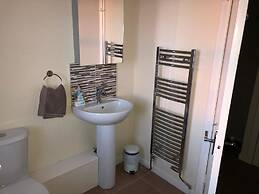 Petfriendly-beachfront-sunsetfacingsunporch-garden