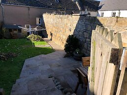 Petfriendly-beachfront-sunsetfacingsunporch-garden