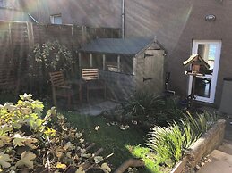 Petfriendly-beachfront-sunsetfacingsunporch-garden