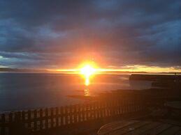 Petfriendly-beachfront-sunsetfacingsunporch-garden
