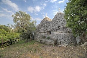 Trullo Grotta Cisternino by Typney
